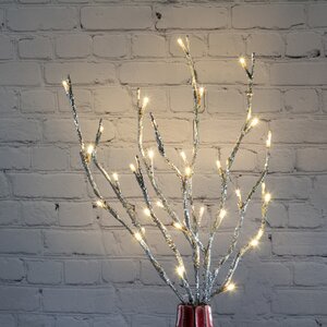 Светящаяся ветка Ористано 50 см серебряная, 30 теплых белых LED ламп, на батарейках (Kaemingk, Нидерланды). Артикул: ID12990