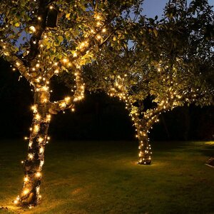 Гирлянды на дерево Клип Лайт Quality Light Cap 60 м, 600 экстра теплых белых LED ламп с холодным мерцанием, прозрачный ПВХ, IP65 BEAUTY LED фото 1