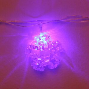 Светодиодная гирлянда Прищепки Снежинки 4 м, 20 разноцветных ламп, прозрачный ПВХ, IP20 Serpantin фото 2