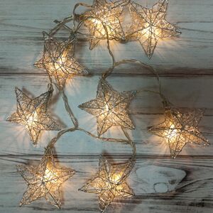 Светодиодная гирлянда на батарейках Звезды Оскар 1.35 м 10 теплых белых LED ламп, прозрачный ПВХ, IP20 (Kaemingk, Нидерланды). Артикул: 480459