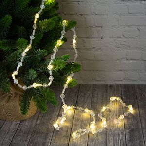 Светодиодная гирлянда на батарейках Кристаллы Астер 1.8 м 26 теплых белых LED ламп, прозрачный ПВХ, IP20 (Kaemingk, Нидерланды). Артикул: 481922-1