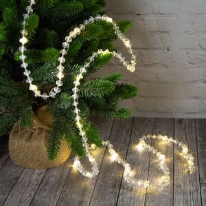 Светодиодная гирлянда на батарейках Кристаллы Флоран 1.8 м 26 теплых белых LED ламп, прозрачный ПВХ, IP20 (Kaemingk, Нидерланды). Артикул: 481922-2