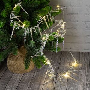 Светодиодная гирлянда на батарейках Арктические Сосульки 1.2 м 13 теплых белых LED ламп, серебряная проволока, IP20 (Kaemingk, Нидерланды). Артикул: 482046