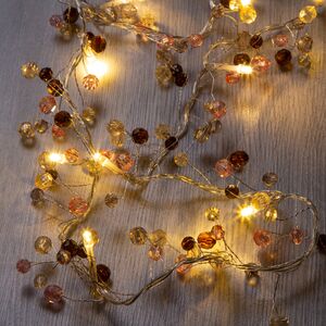 Светодиодная гирлянда на батарейках Волшебные Самоцветы 1.5 м, 16 теплых белых LED ламп, прозрачный ПВХ, IP20 (Kaemingk, Нидерланды). Артикул: 482691