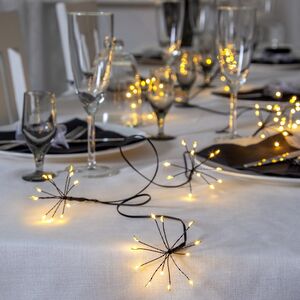 Светодиодная гирлянда на батарейках Flower Fireworks, 2.1 м, 96 теплых белых LED ламп, черный ПВХ, IP44 (Star Trading, Швеция). Артикул: 729-27-1