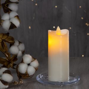 Светодиодная восковая свеча Живое Пламя 11*5 см кремовая, с диммером и возможностью работы от пульта, на батарейках (Koopman, Нидерланды). Артикул: AX5402120