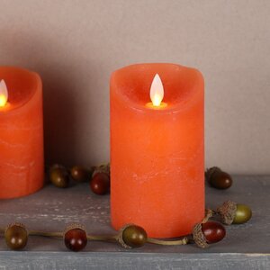 Светодиодная свеча с имитацией пламени 12.5 см, оранжевая восковая, батарейка Peha фото 1